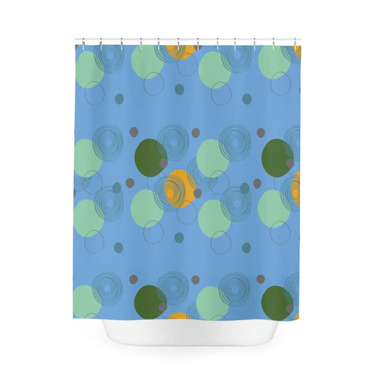 Blue shower curtain with green, orange, and gray circles pattern.