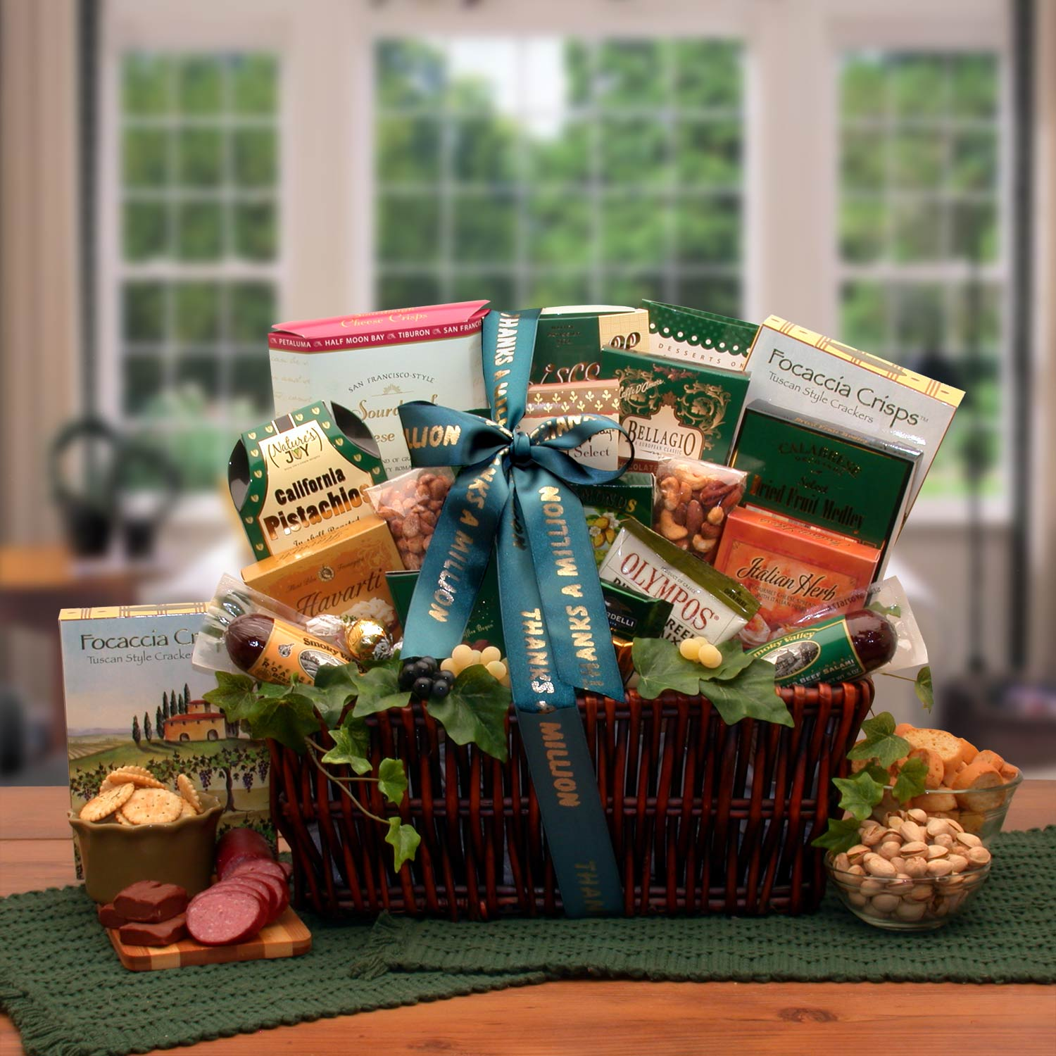 Gift basket with assorted gourmet foods on a wooden table.