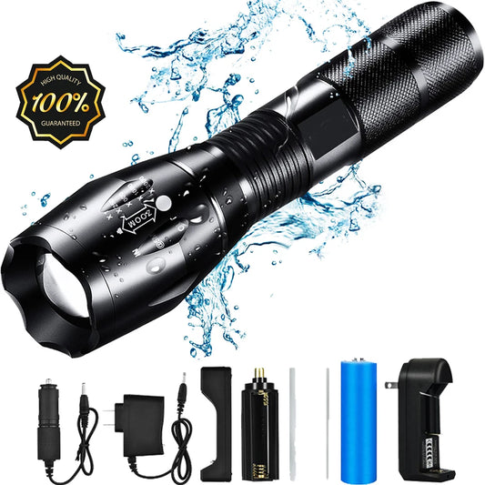 Black waterproof flashlight with batteries and multiple charging accessories.