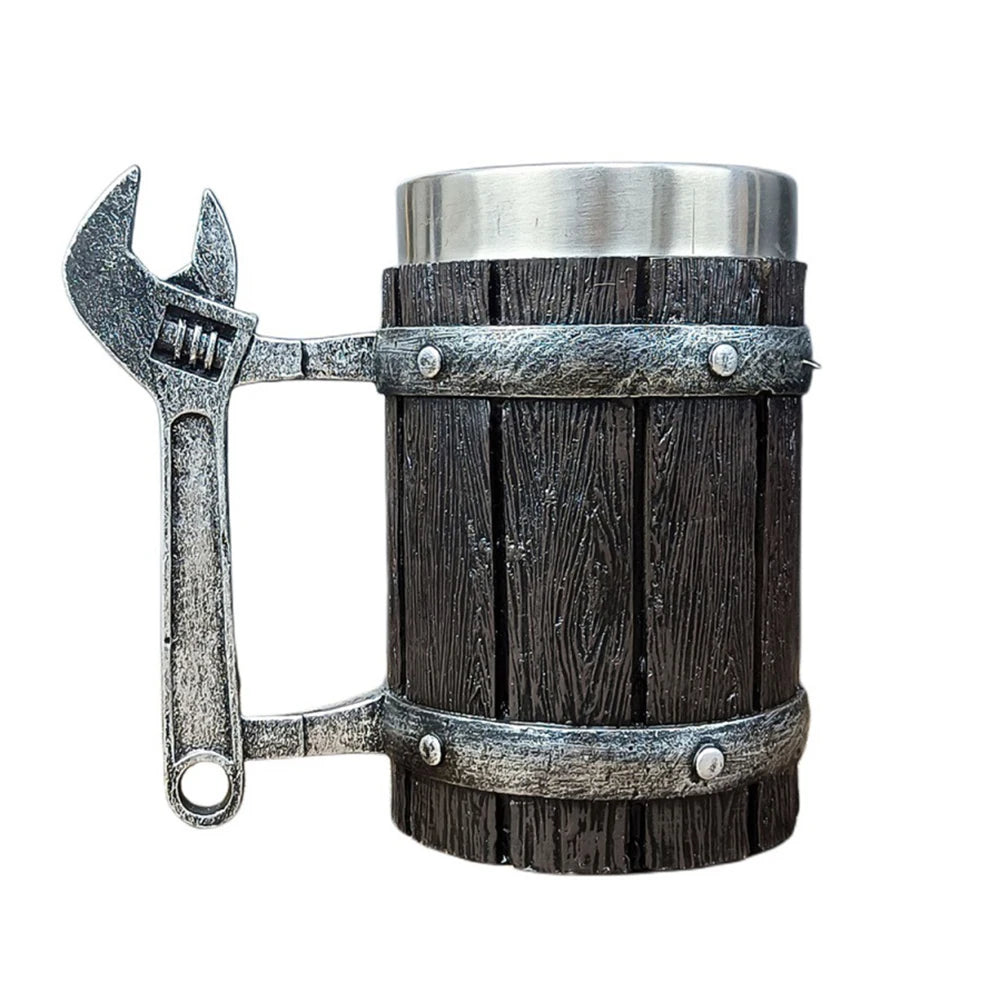 Mug designed to resemble wooden barrel with attached metal wrench.