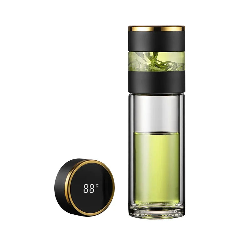 Clear tea infuser bottle with loose leaves and digital temperature lid.